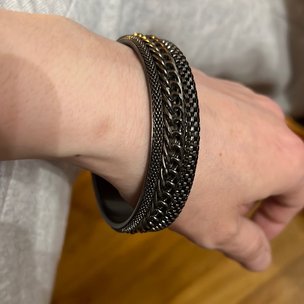 bracelet, like new. Dark gray/silver in color. No brand name.